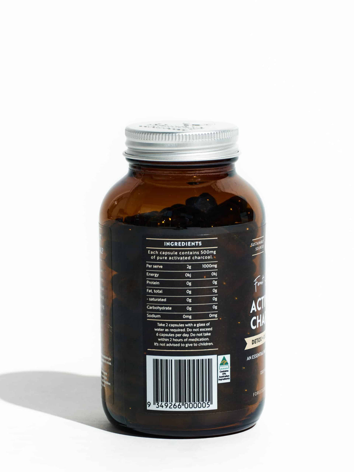 Activated Charcoal Capsules bottle showing ingredient details with 500mg pure activated charcoal per capsule and dosage instructions