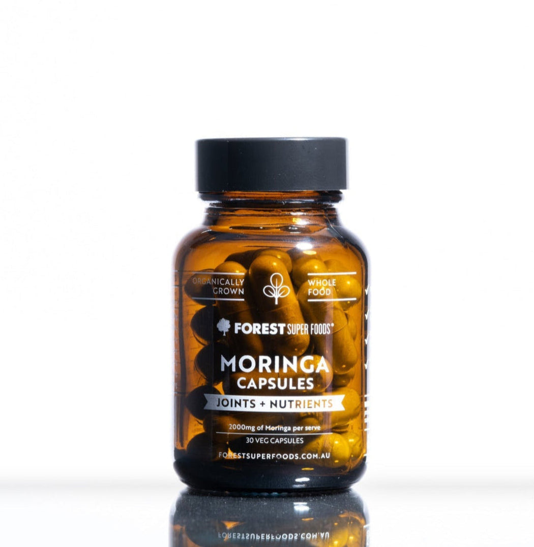 Mini Organic Moringa Capsules amber glass bottle with 30 vegetable capsules for joint support and nutrient boost