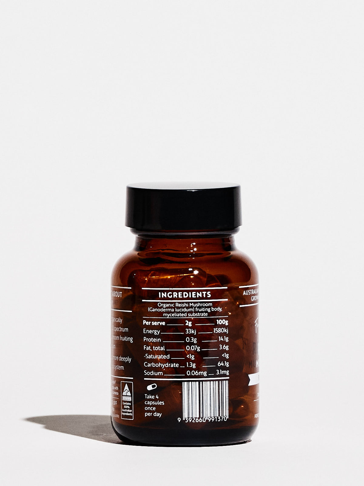 Mini Australian Grown Reishi Mushroom Capsules amber bottle showing ingredient and nutritional information panel